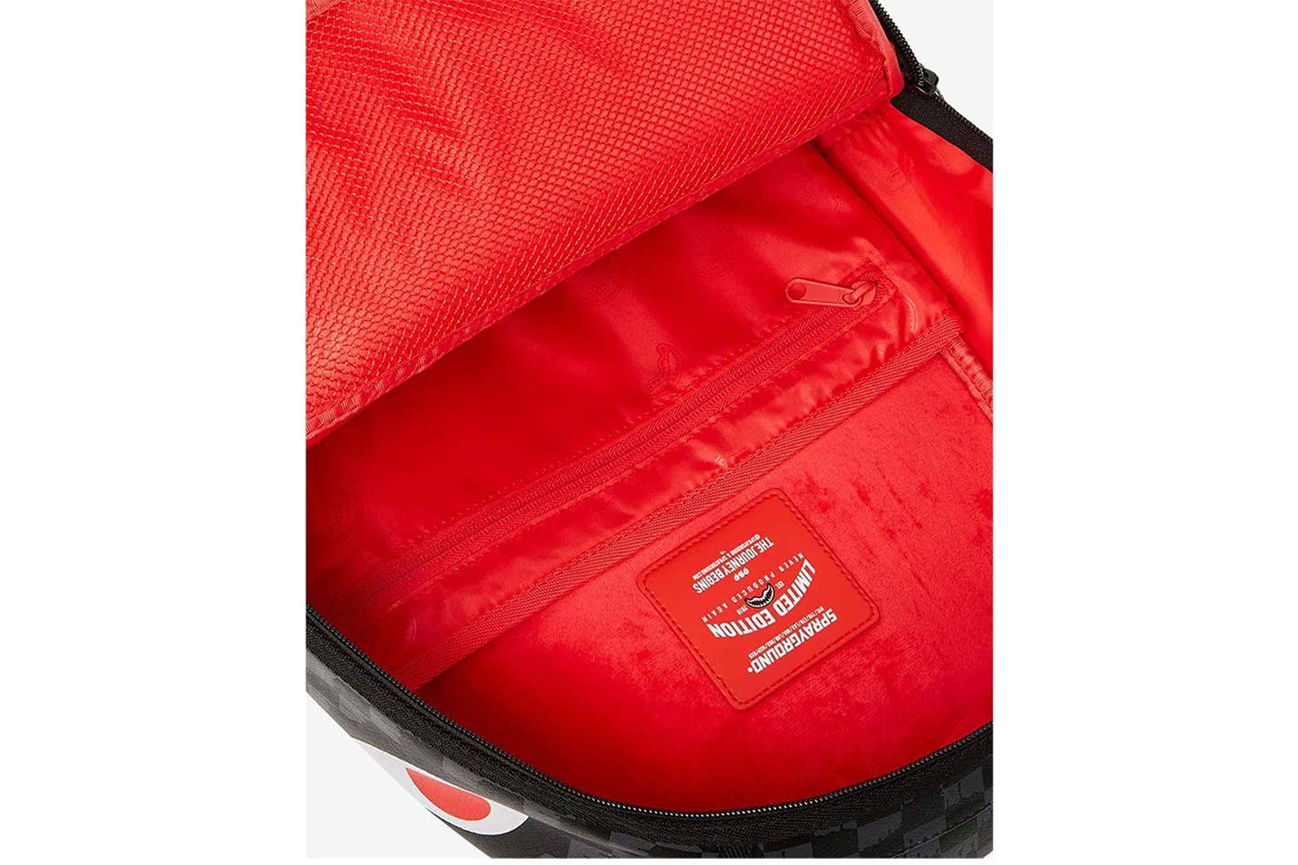 Mochila Sprayground Drip Check Shark (DLXSF) con estampado